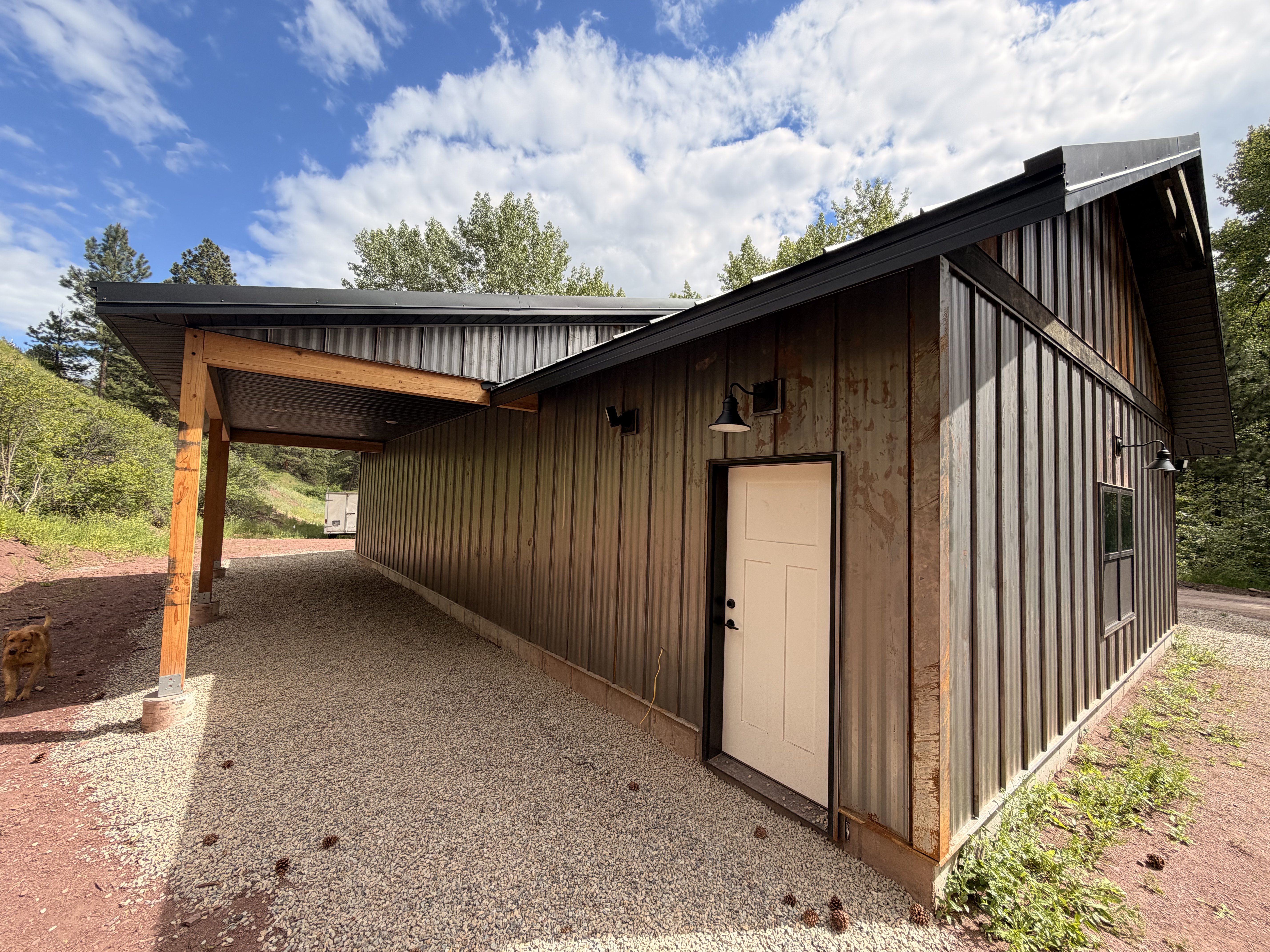Carport addition with wood post detail — outbuilding build