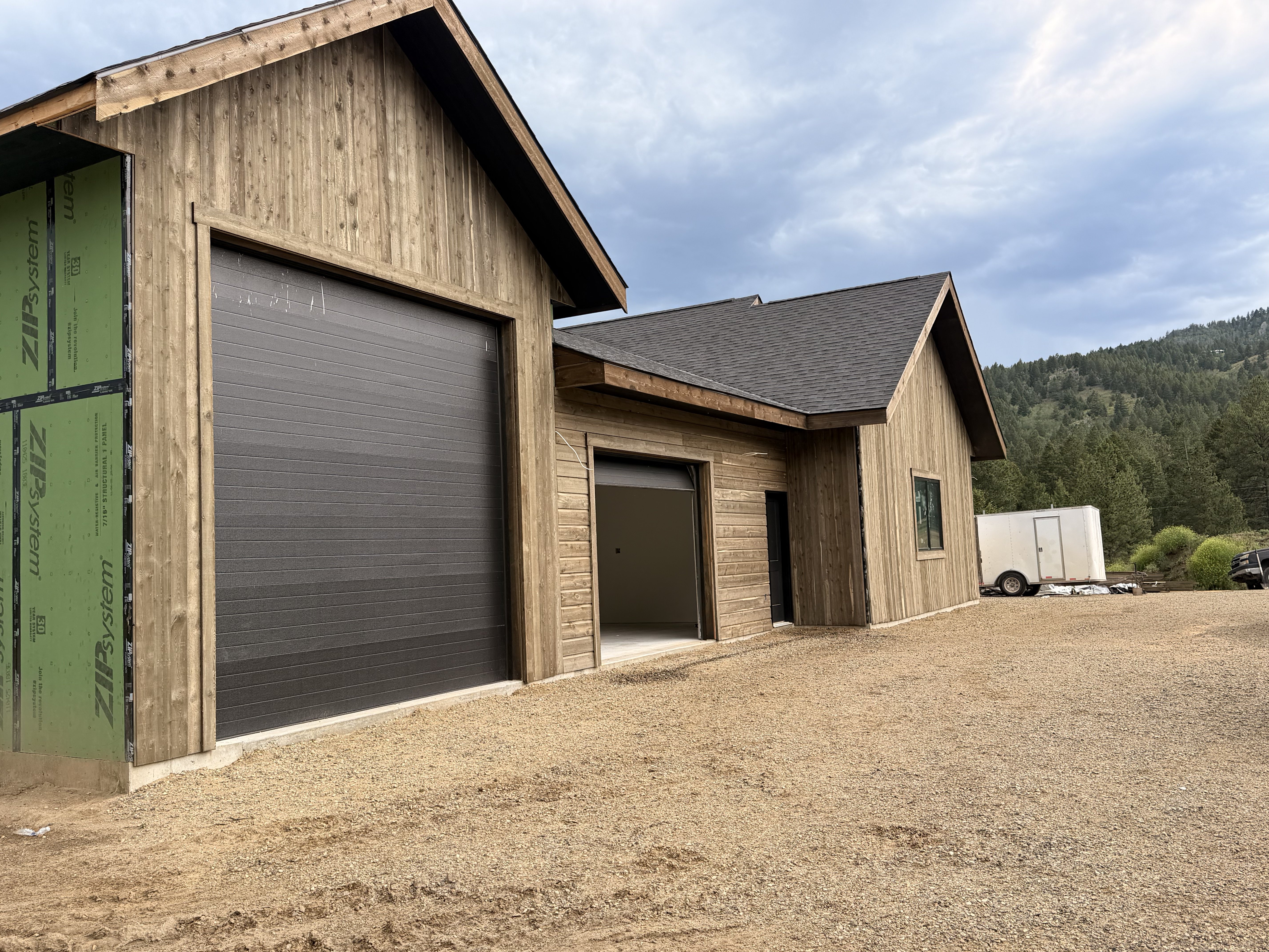 New construction exterior — wood siding & roofing