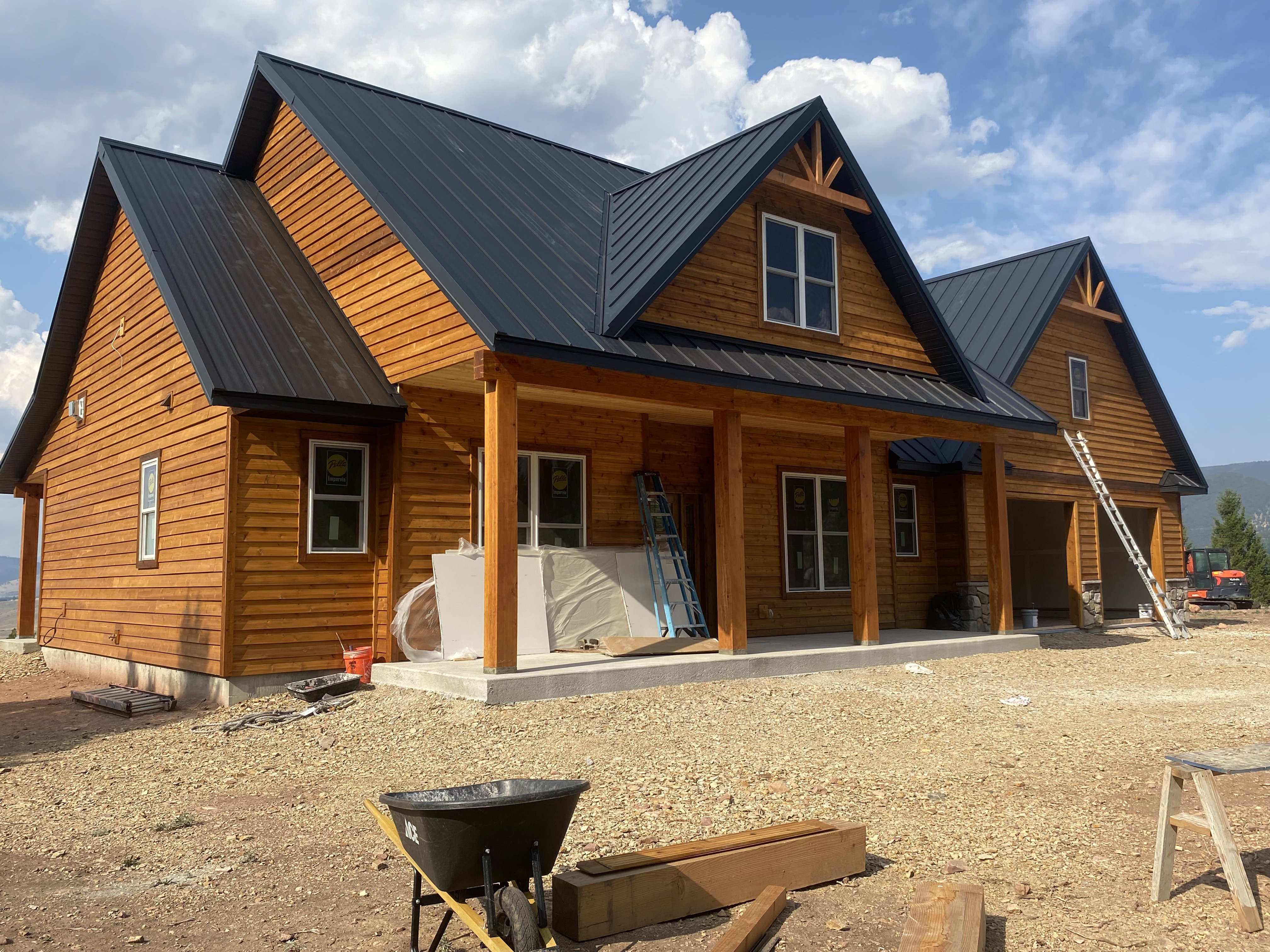 Top Line Construction — Montana home with metal roof and wood siding